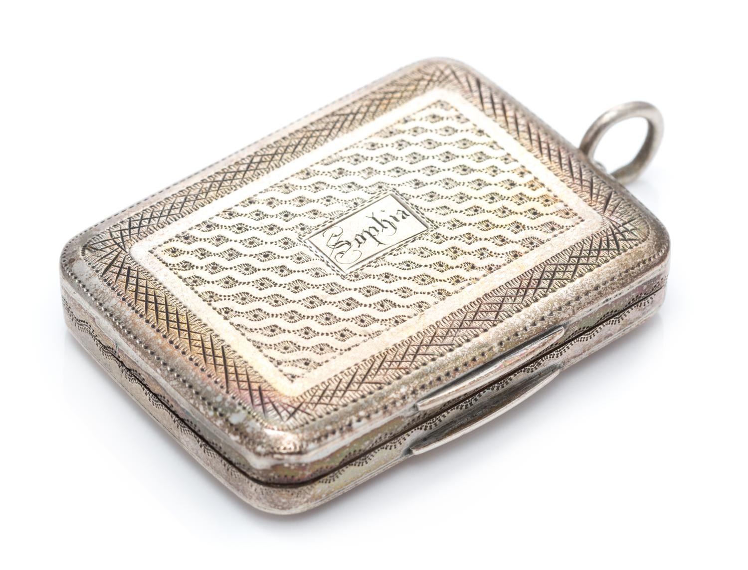 A George III Silver Vinaigrette, Samuel Pemberton, Birmingham, 1786, having a geometric decorated lid centered by an engraved cartouche