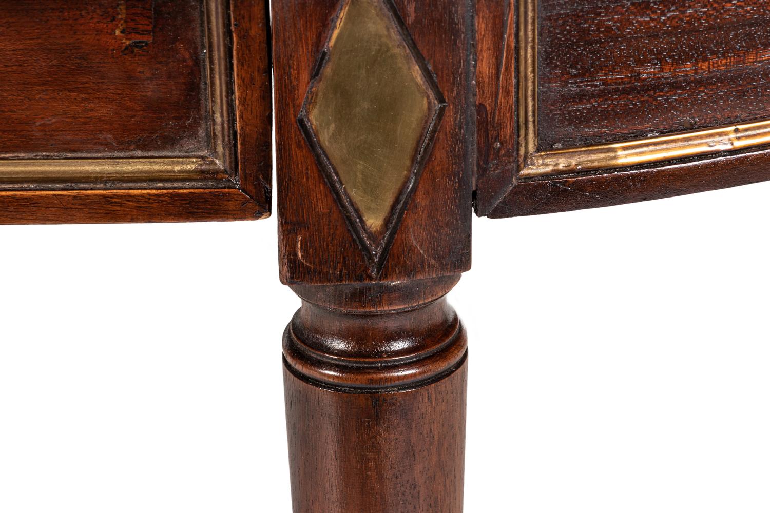 A Directoire Brass Mounted Mahogany Dining Table