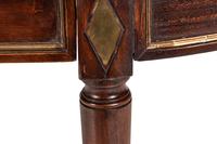 A Directoire Brass Mounted Mahogany Dining Table