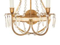 A Pair of Swedish Parcel Gilt Two-Light Sconces with Cut Glass Beaded Swags