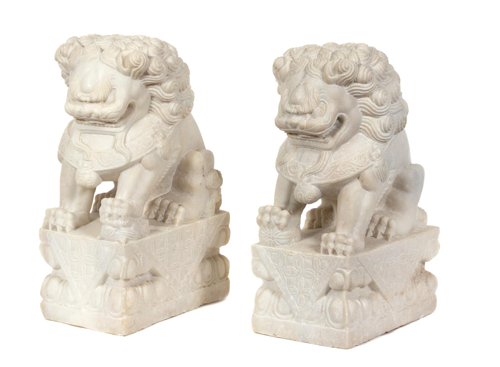 A Pair of Chinese Carved White Marble Foo Lions Height 19 1/2 inches. — 19TH/20TH CENTURY
