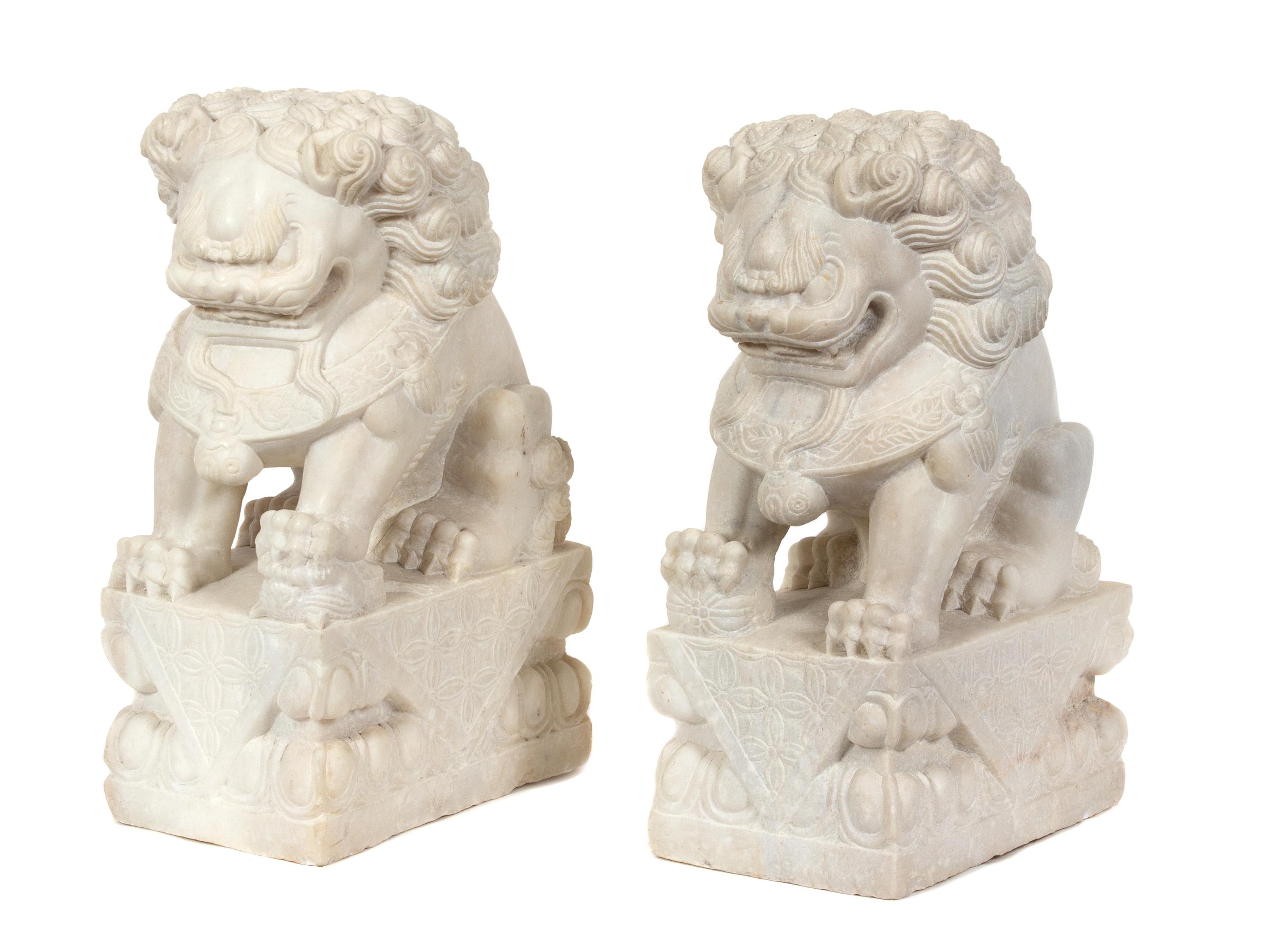 A Pair of Chinese Carved White Marble Foo Lions Height 19 1/2 inches. — 19TH/20TH CENTURY