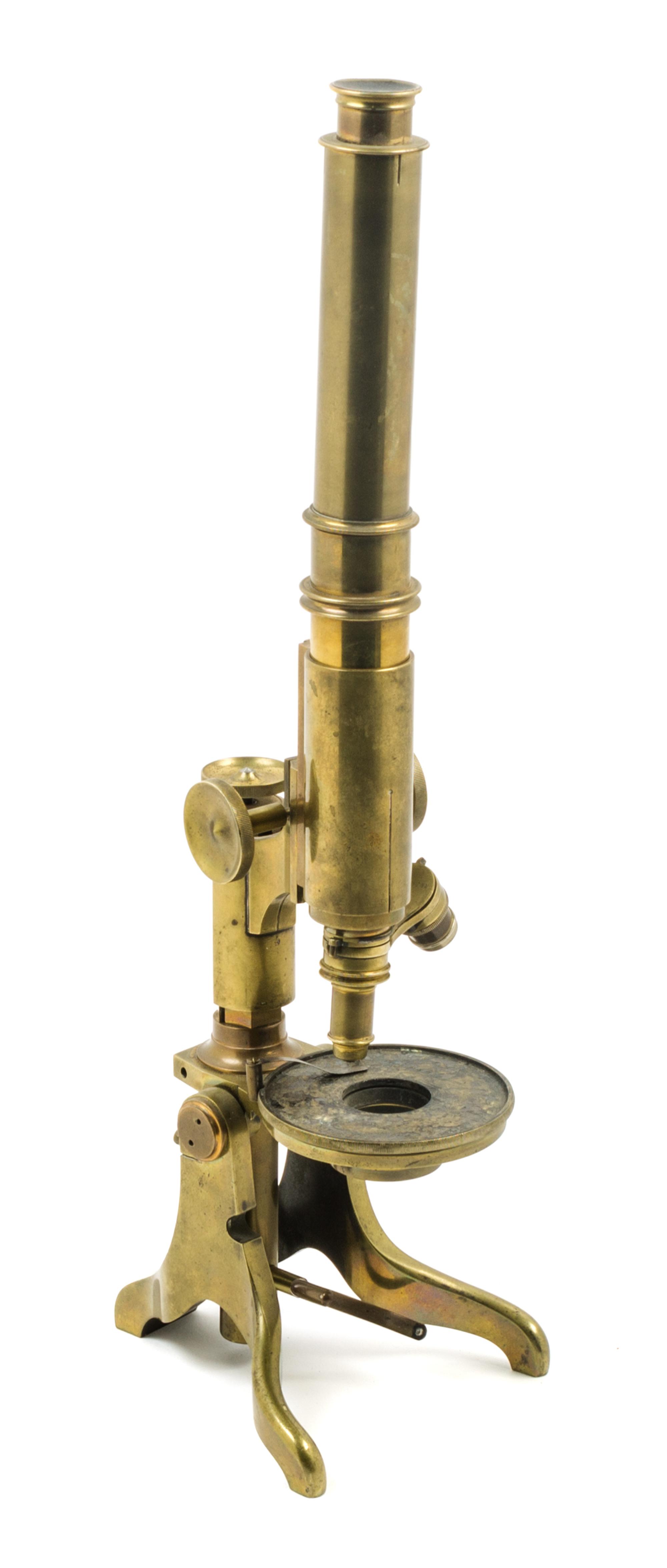 An English Brass Microscope Height 10 inches. — BAKER, LONDON, 19TH CENTURY