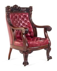 A Renaissance Revival Carved Mahogany Gentleman's and Lady's Chair Set