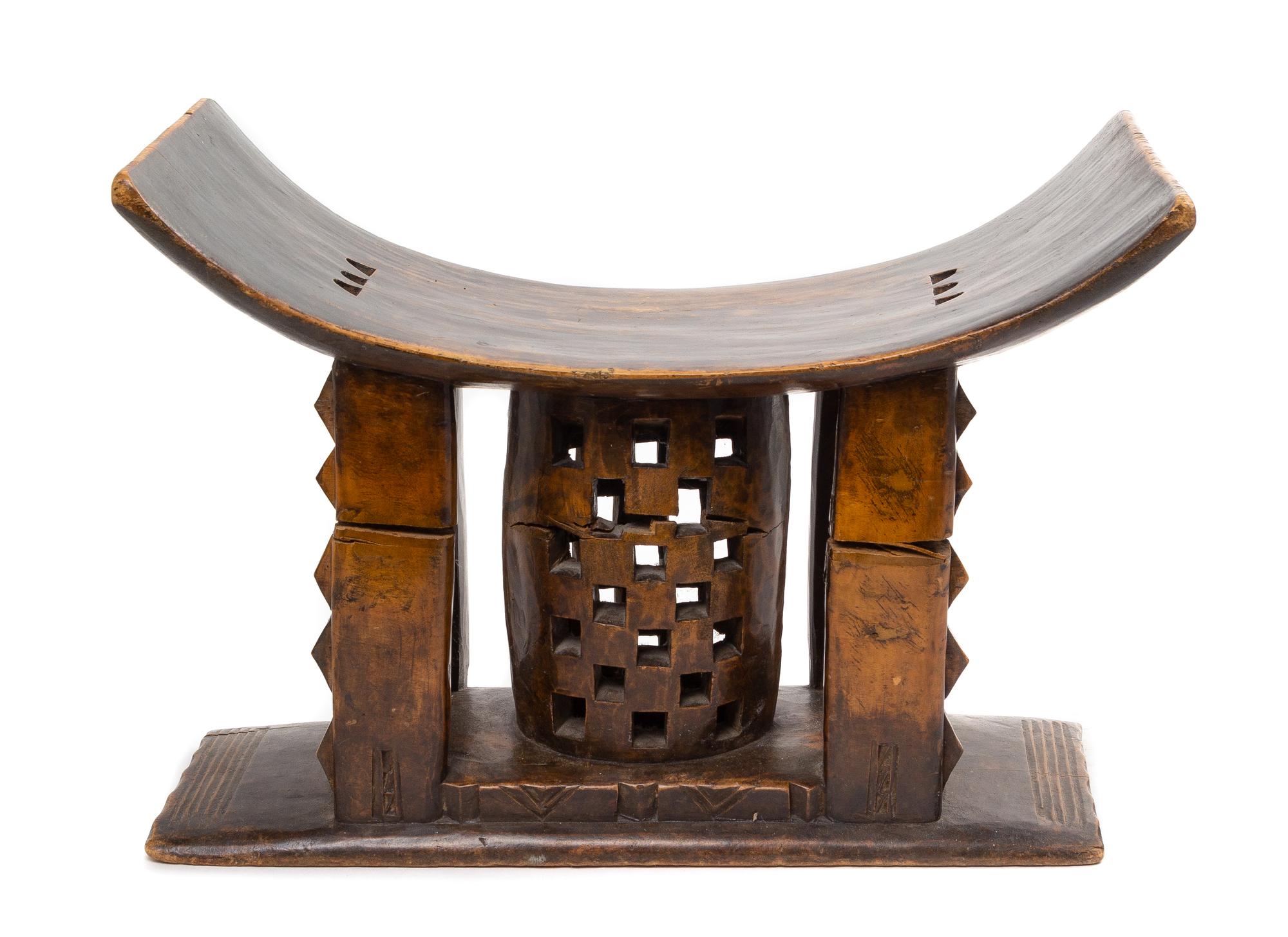 An Ashanti Stool Height 15 x width 21 3/4 inches. — GHANA, EARLY TO MID-20TH CENTURY