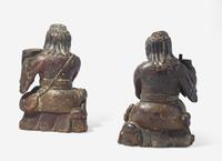 A Pair of Chinese Carved Wood Figural Candleholders