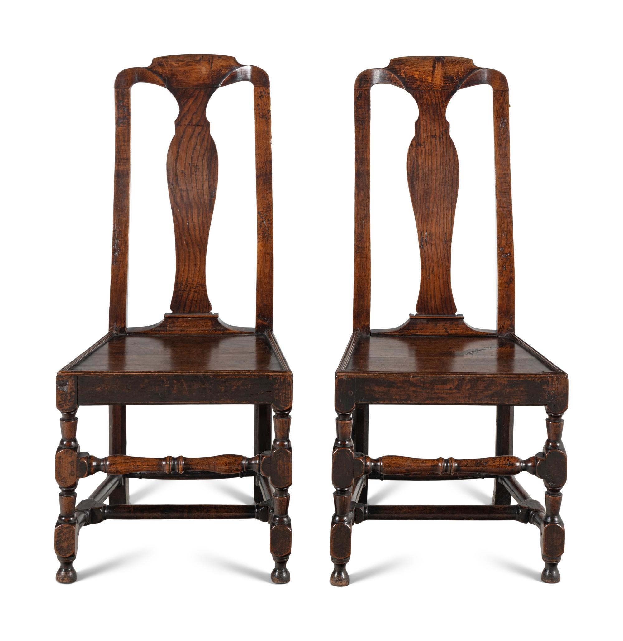 A Pair of Queen Anne Oak 'Solid Seat' Side Chairs