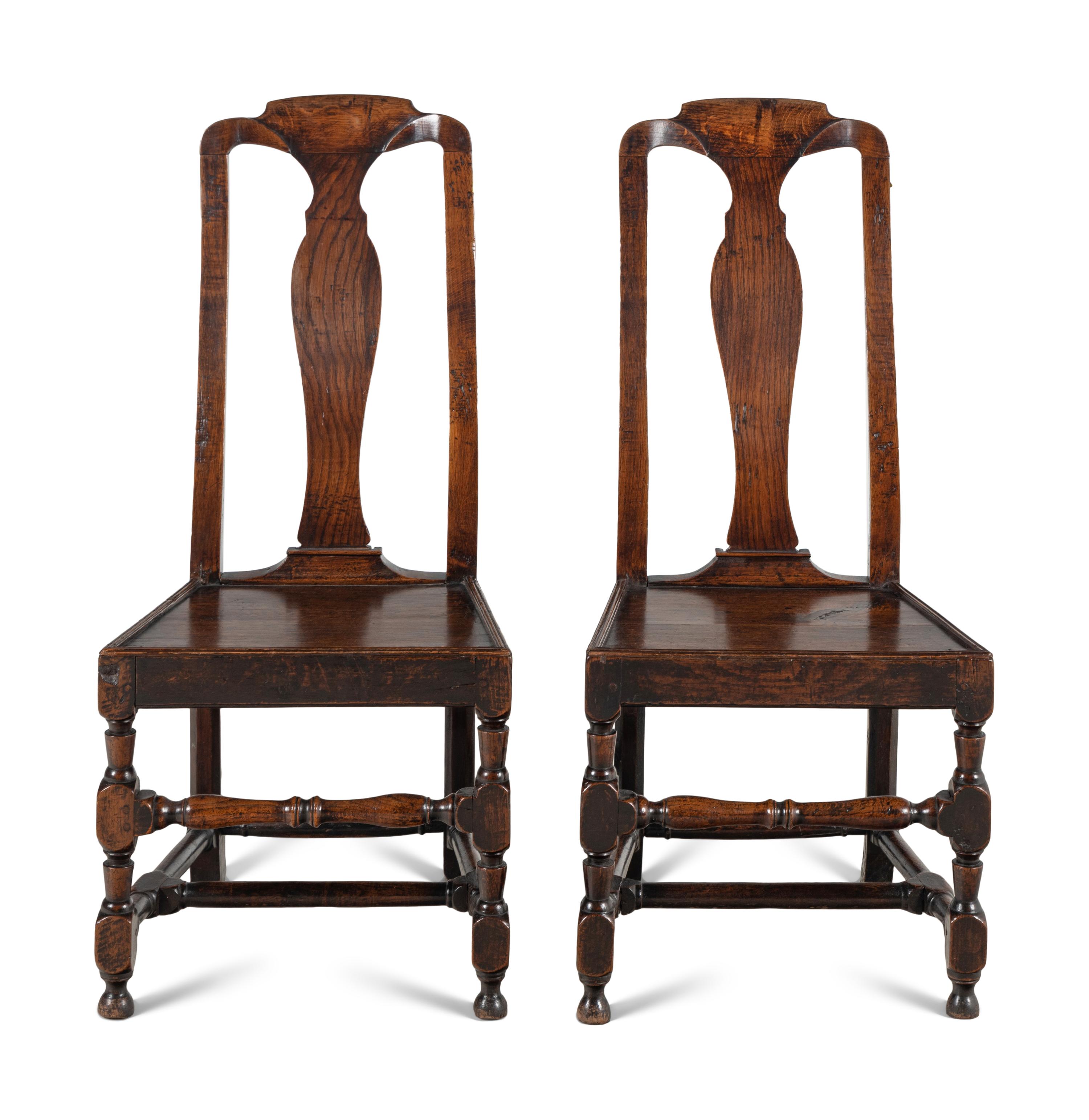 A Pair of Queen Anne Oak 'Solid Seat' Side Chairs