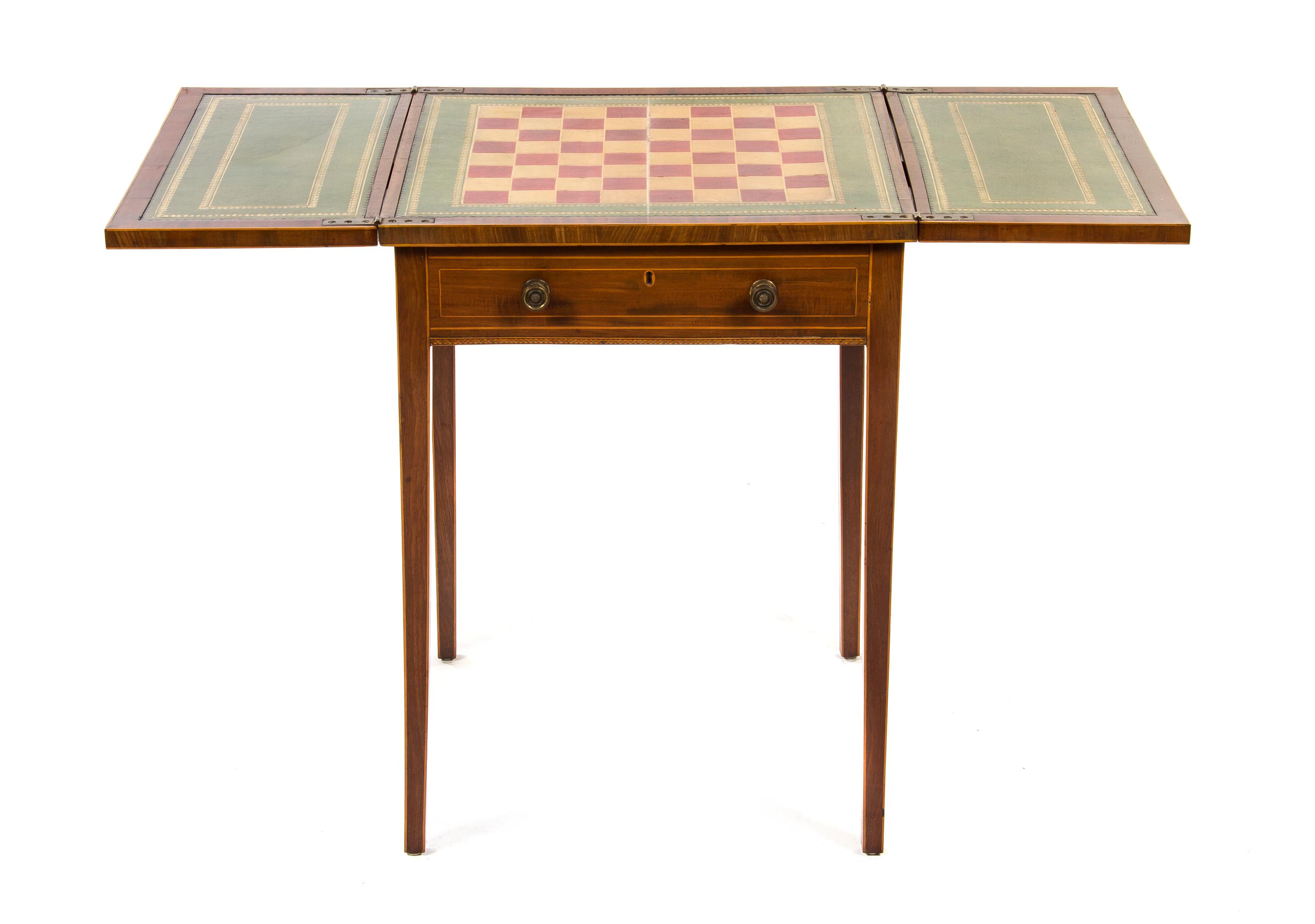 A George III Inlaid Mahogany Games Table, Height 27 1/8 x width 20 x depth 19 3/4 inches (closed).