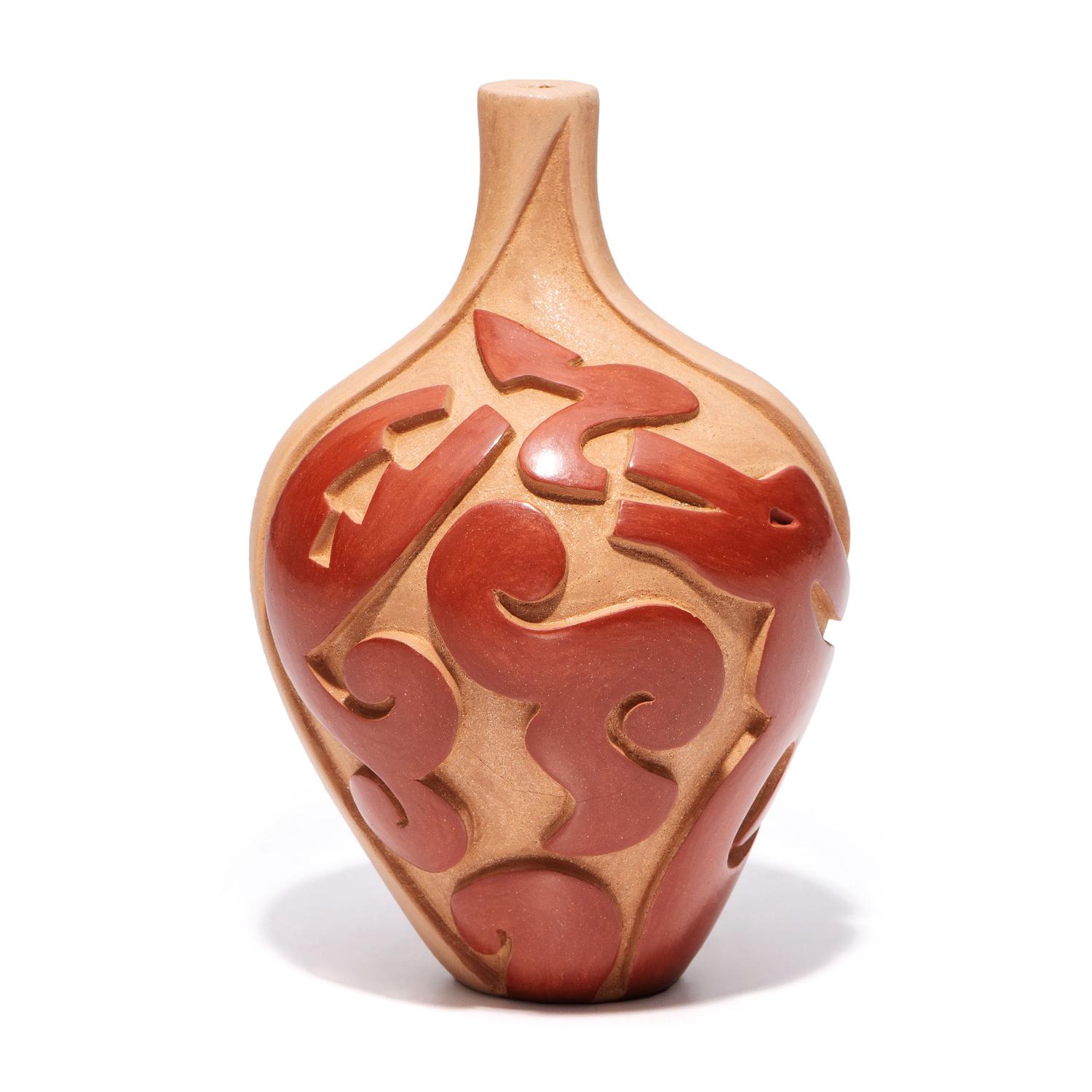Carved Micaceous Redware Jar, with Avanyu and Raindrops