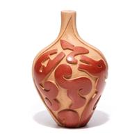 Carved Micaceous Redware Jar, with Avanyu and Raindrops