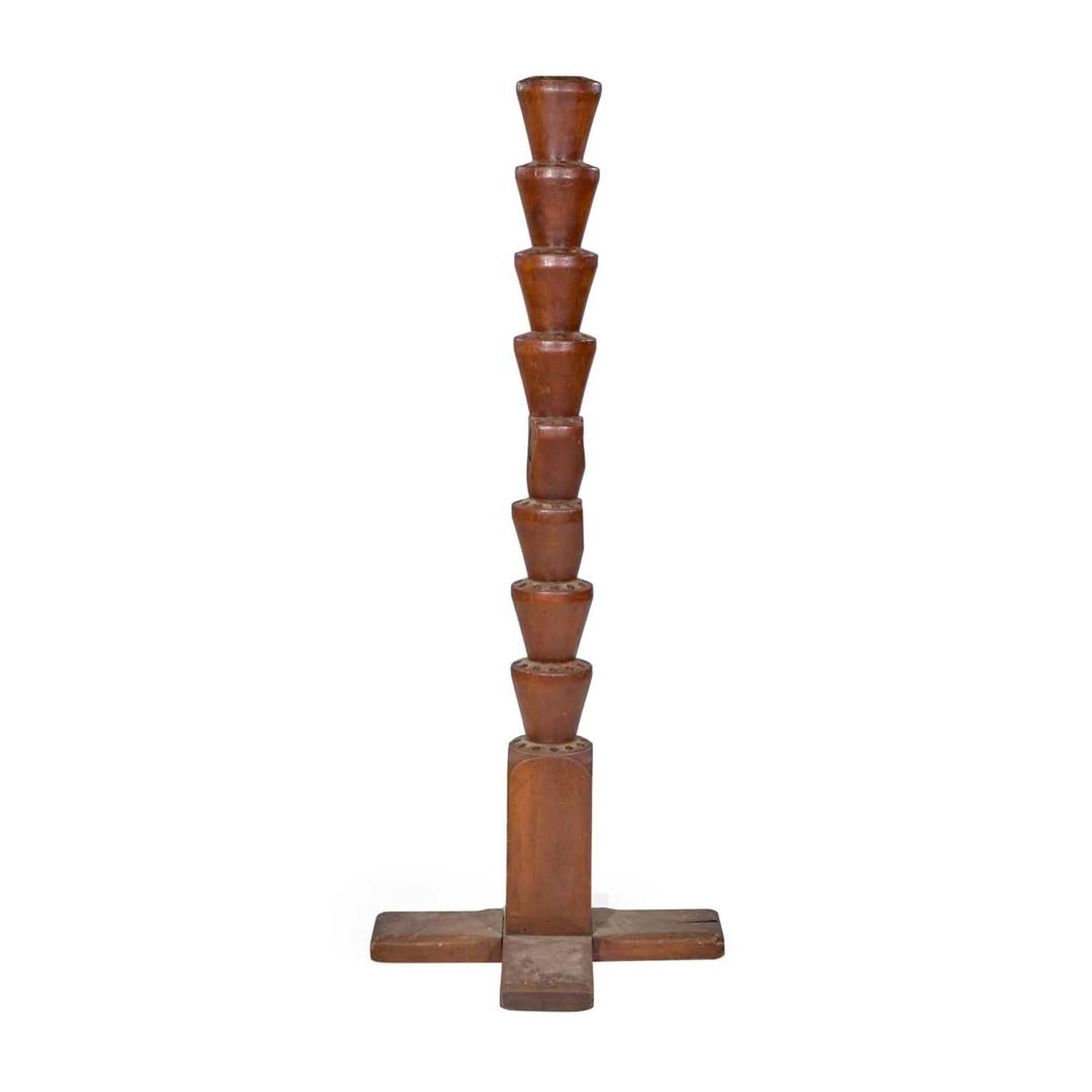 [FLAGS]. A large 9-tier wooden flag stand. Late 19th century.