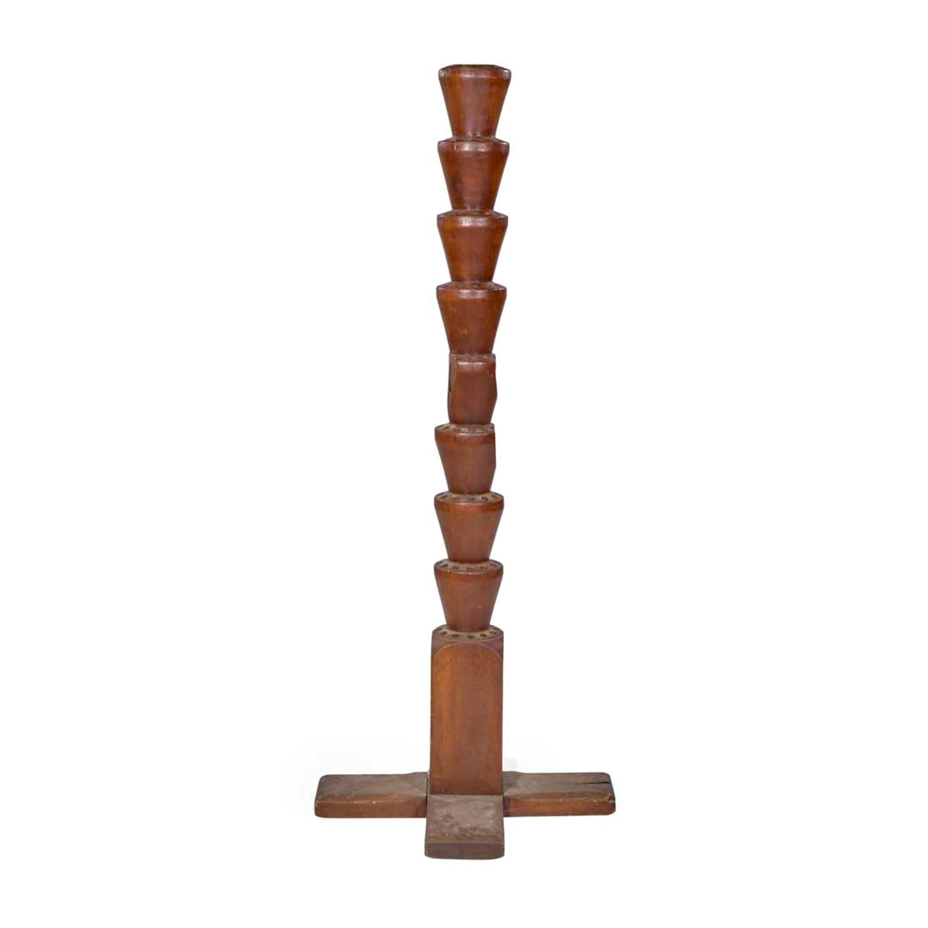 [FLAGS]. A large 9-tier wooden flag stand. Late 19th century.