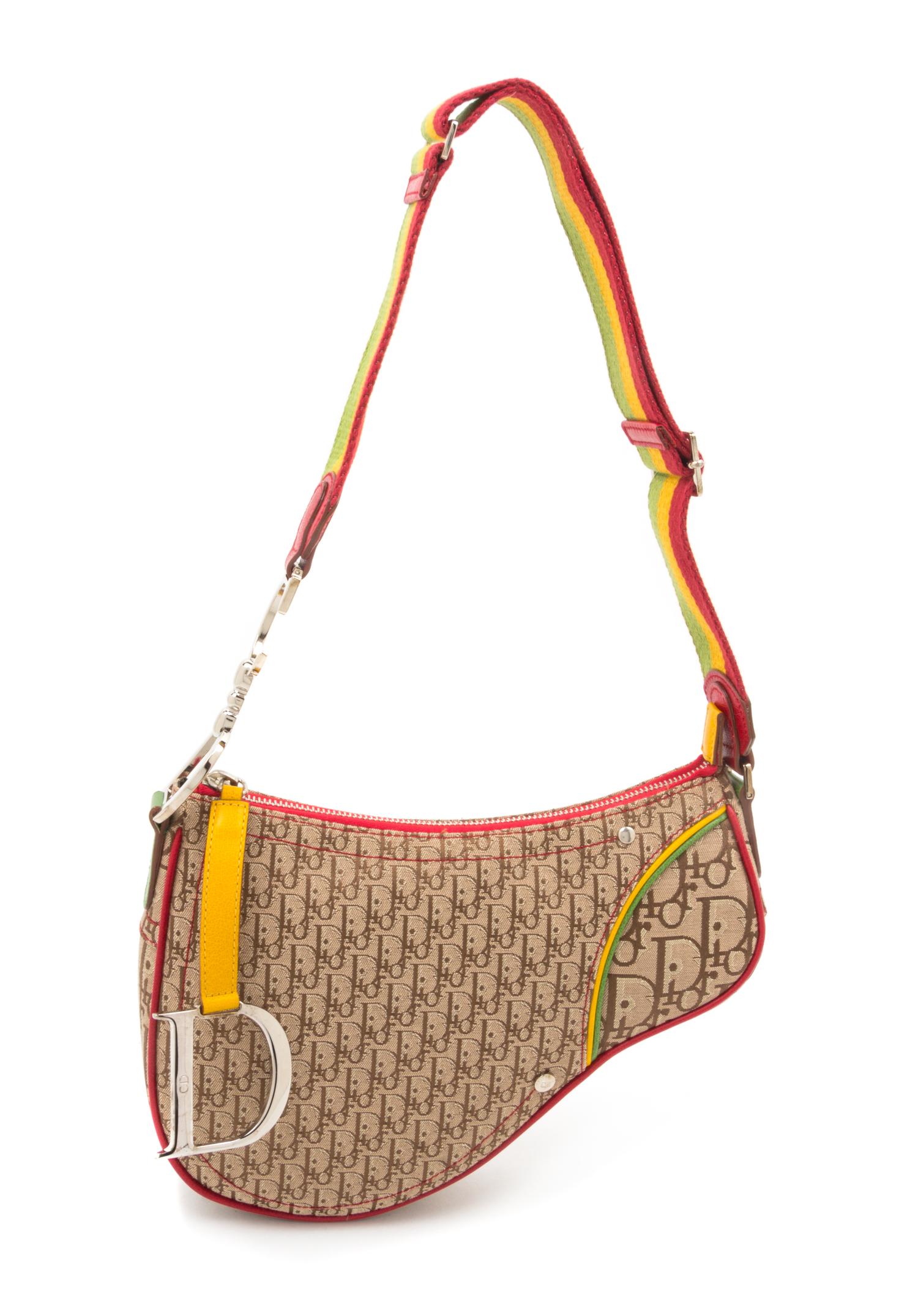 A Christian Dior Rasta Zipper Saddle Handbag, 10" x 7" x 2".