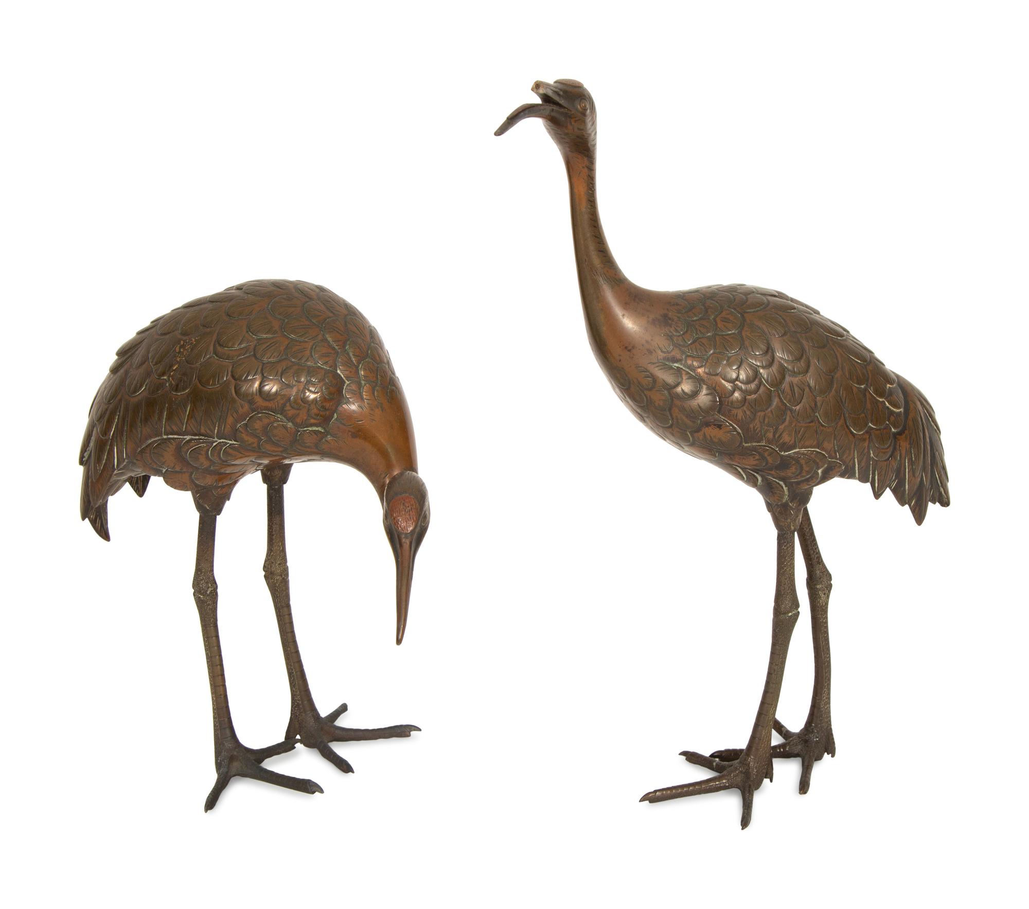 A Pair of Japanese Bronze Figures of Cranes