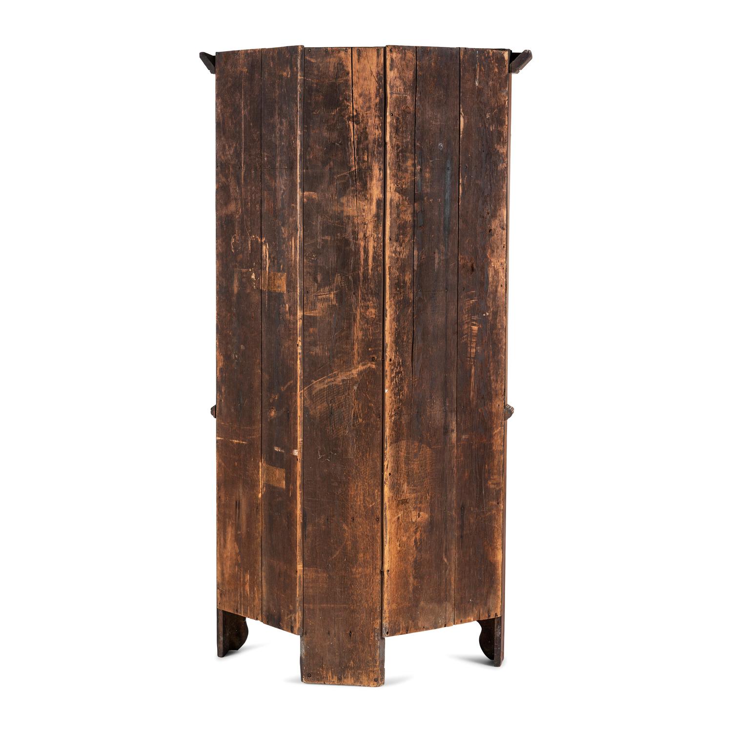 A Chippendale Paneled Cherrywood Corner Cupboard