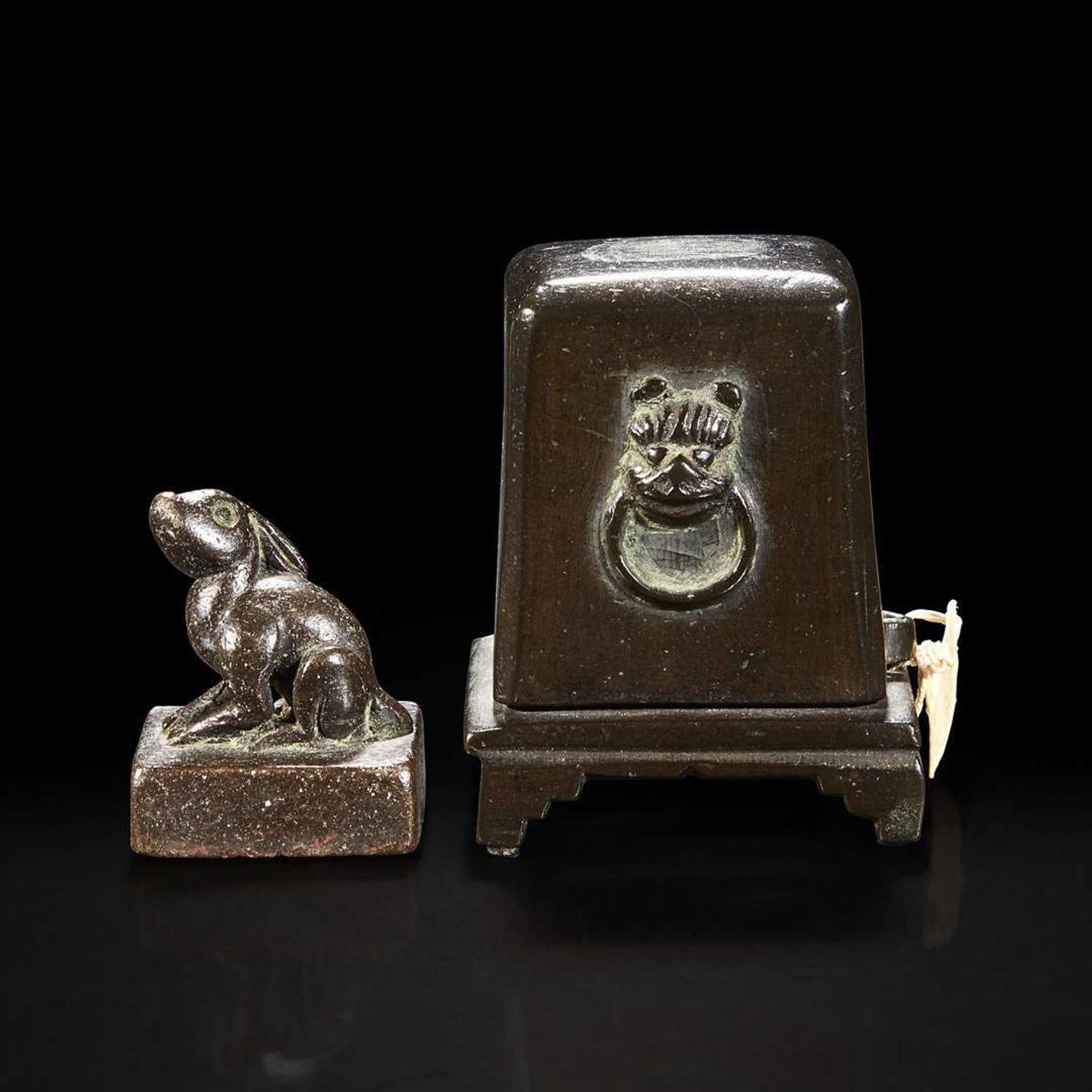 A Chinese pale celadon jade archaistic libation cup and a bronze rabbit seal 玉匜与铜兔印章一组 The jade 17th/18th Century, the seal possibly Yuan dynasty ?????????? ??????