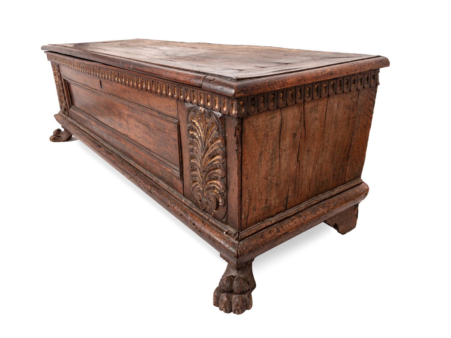 A Spanish Parcel Gilt Carved Walnut Chest
