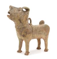 A Chinese Green Glazed Pottery Figure of a Dog Height 13 1/4 inches. — HAN DYNASTY (206 B.C. - A.D. 220)