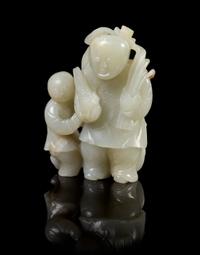 A Chinese Carved Jade Group 16TH/17TH CENTURY Height 3 1/2 x width 2 1/2 inches. — 16TH/17TH CENTURY