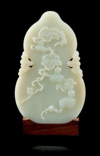 A Celadon Jade Gourd-Form Plaque Height 4 7/8 inches. — 18TH/19TH CENTURY