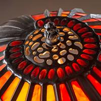 A Cast Bronze and Glass Figural Table Lamp
