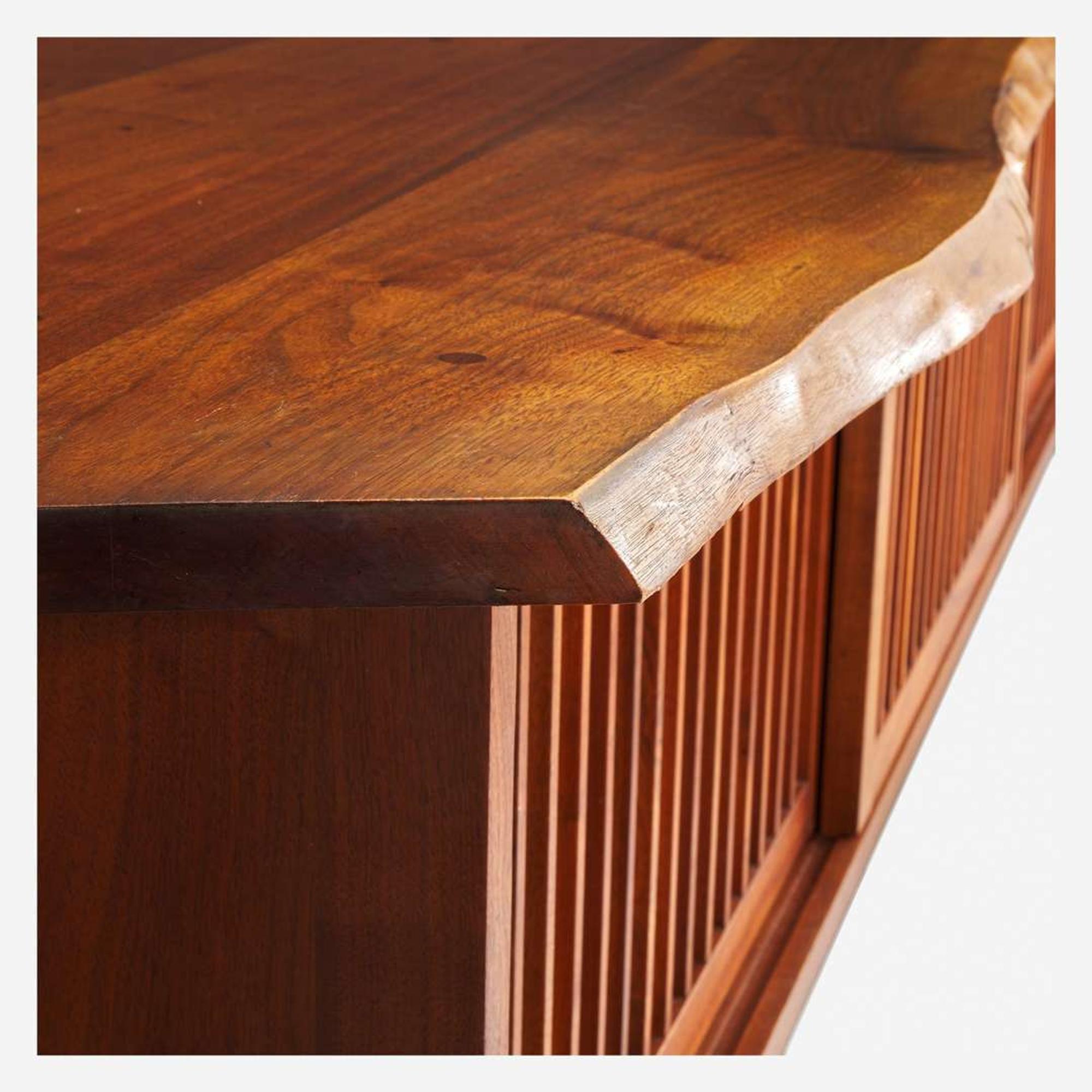 George Nakashima (American, 1905-1990) Triple Sliding-Door Hanging Wall Cabinet, New Hope, Pennsylvania, 1966