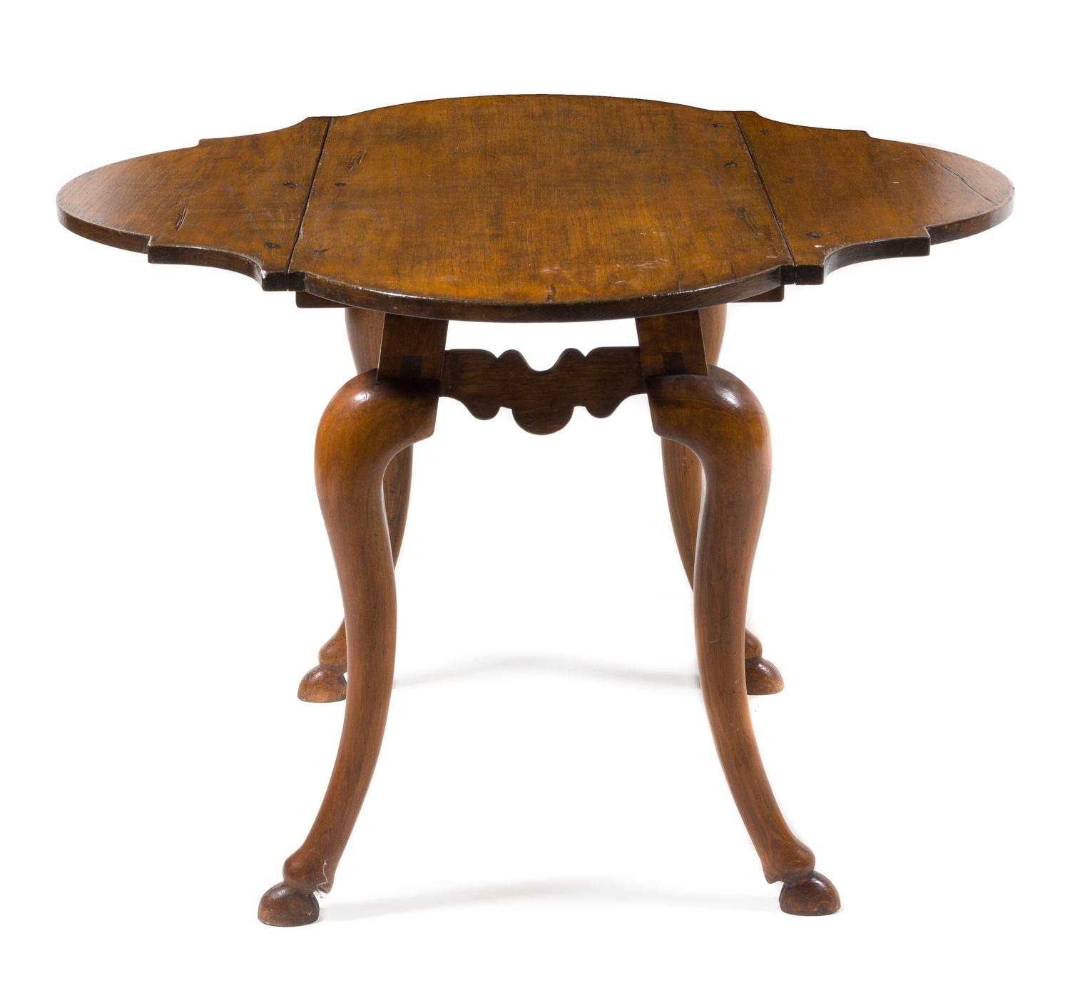 An Italian Fruitwood Drop-Leaf Table Height 30 inches. — 19TH CENTURY