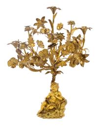 A French Gilt Bronze Seven-Light Figural Candelabrum, Height 22 1/2 inches.