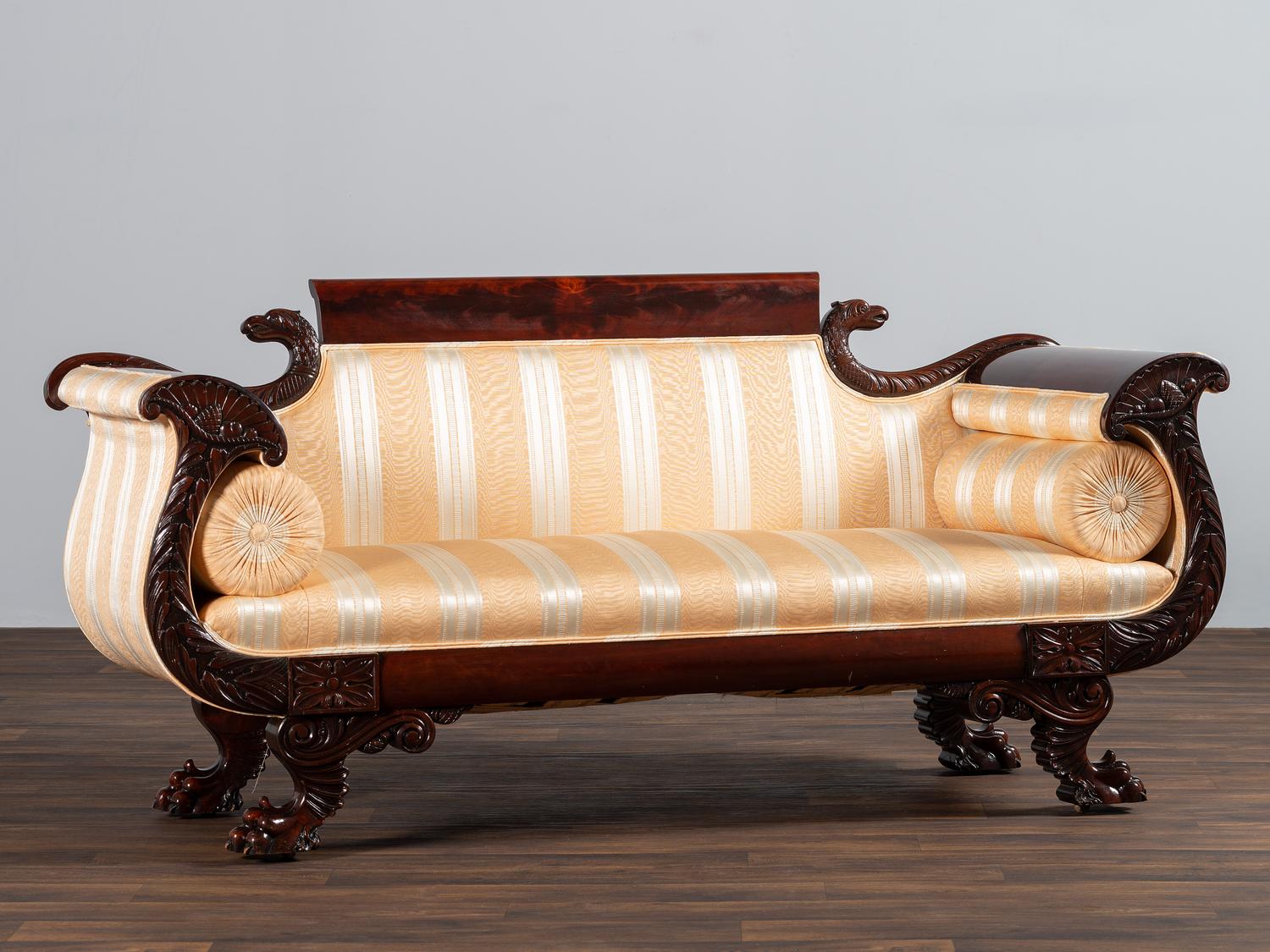 A Classical Style Eagle's Head and Claw-Foot Carved Mahogany Settee