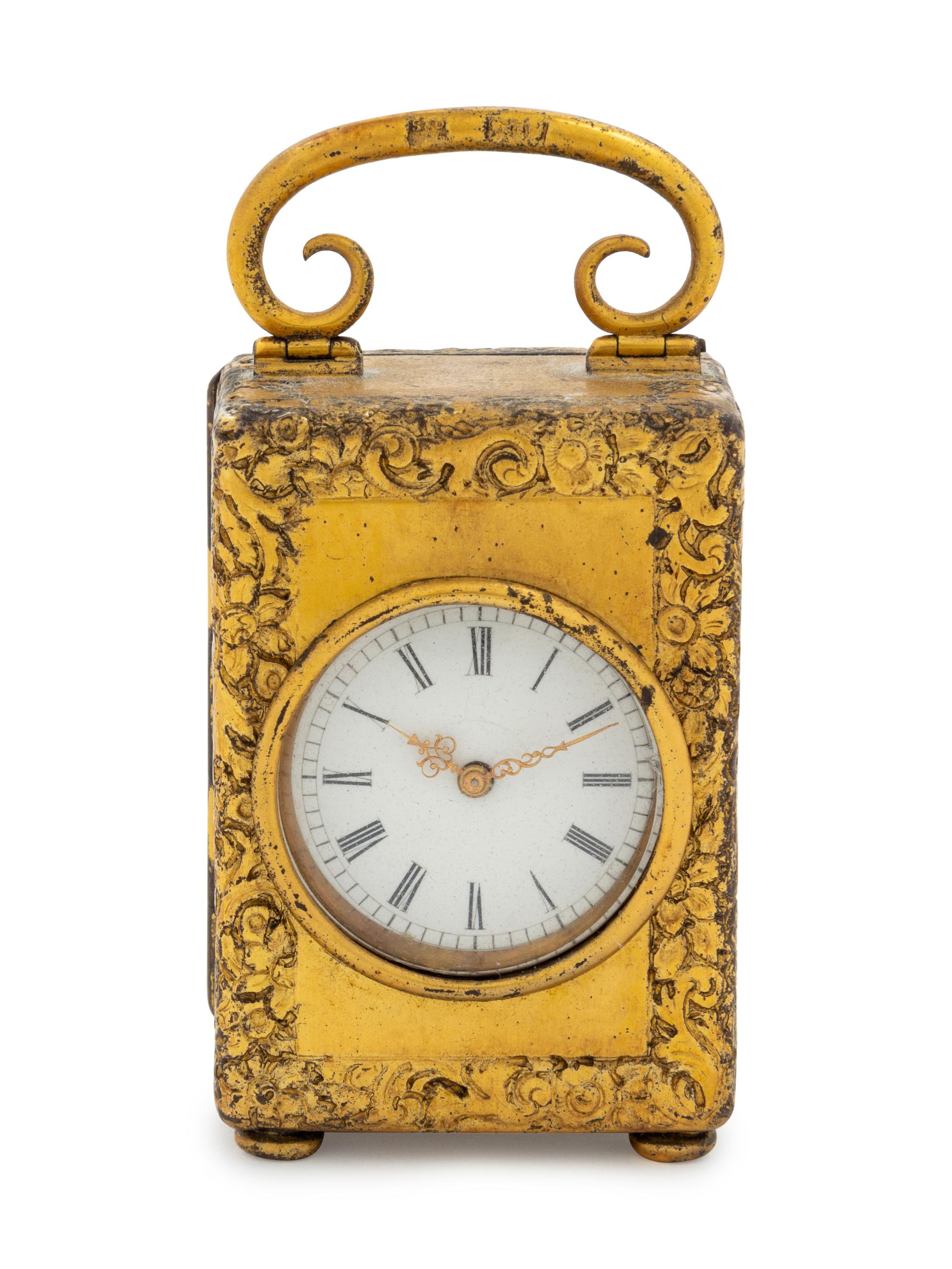 An English Silver-Gilt Miniature Clock