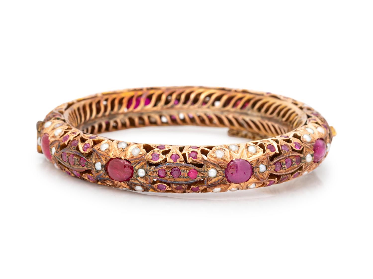 A 14 Karat Yellow Gold, Ruby and Cultured Pearl Bangle Bracelet,
