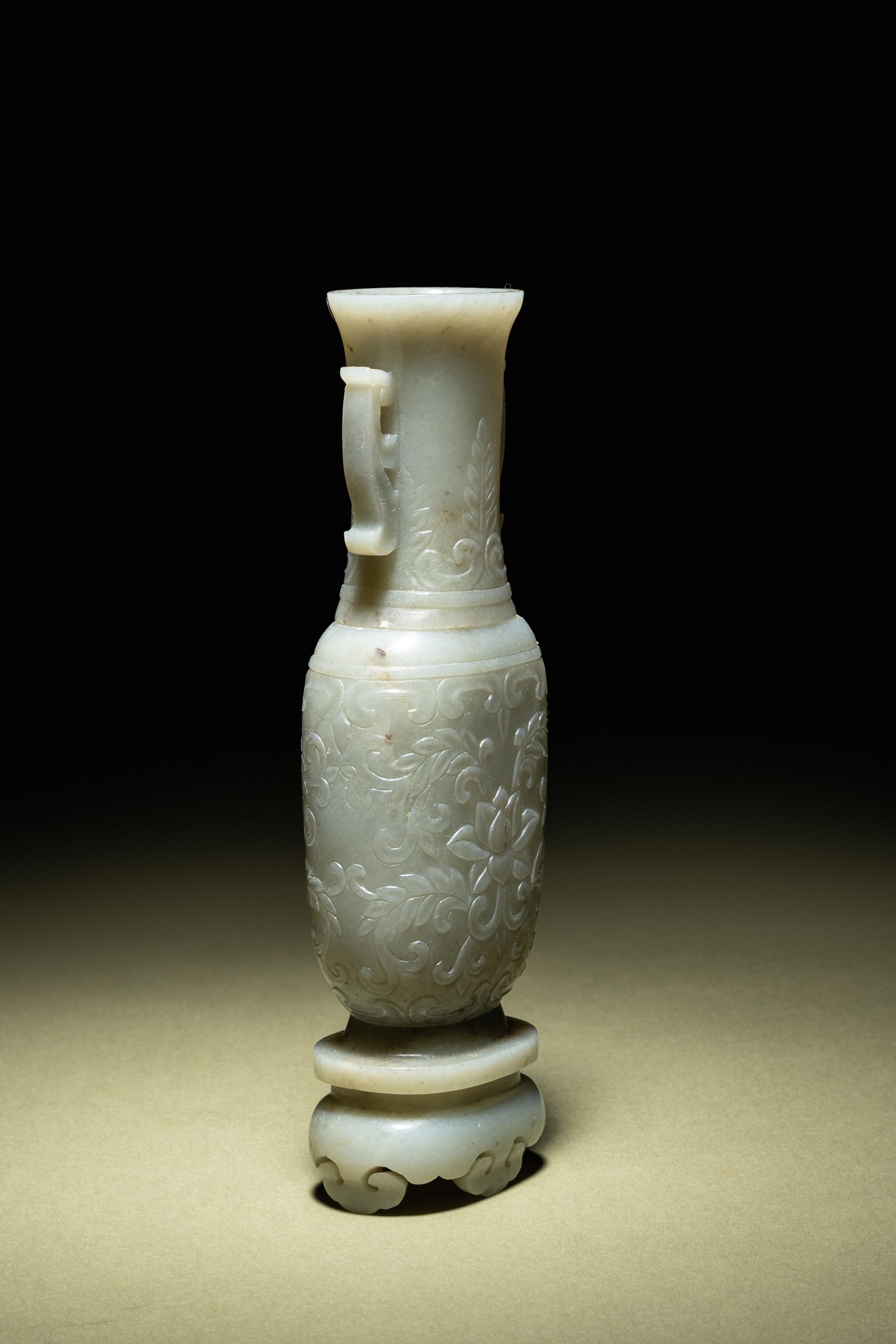 A Small Pale Carved Pale Celadon Jade Vase and Stand