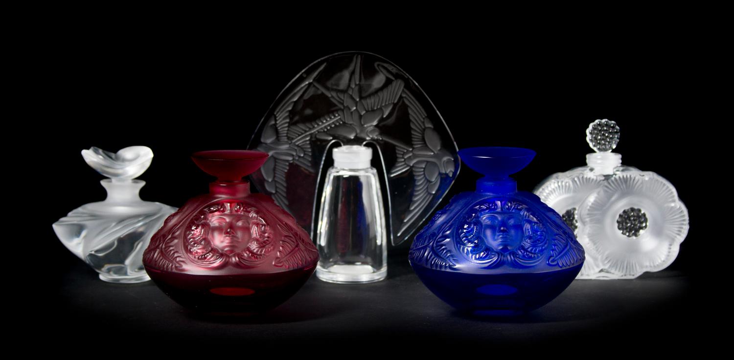 Five Lalique Molded and Frosted Glass Perfume Bottles, Height of tallest 5 1/4 inches.