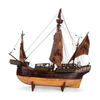 A Painted Wood and Canvas Model of a Three-Masted Ship