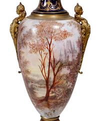 A Sèvres Style Gilt Metal Mounted Porcelain Covered Urn
