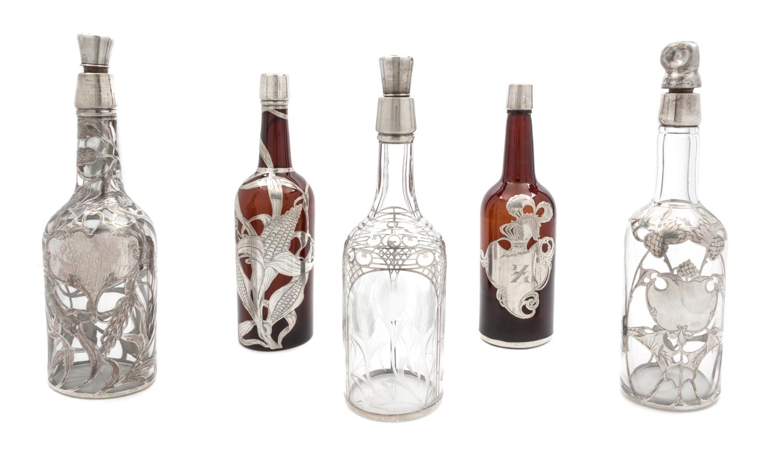 Five Silver Overlay Glass Decanters Height of tallest 12 5/8 inches.