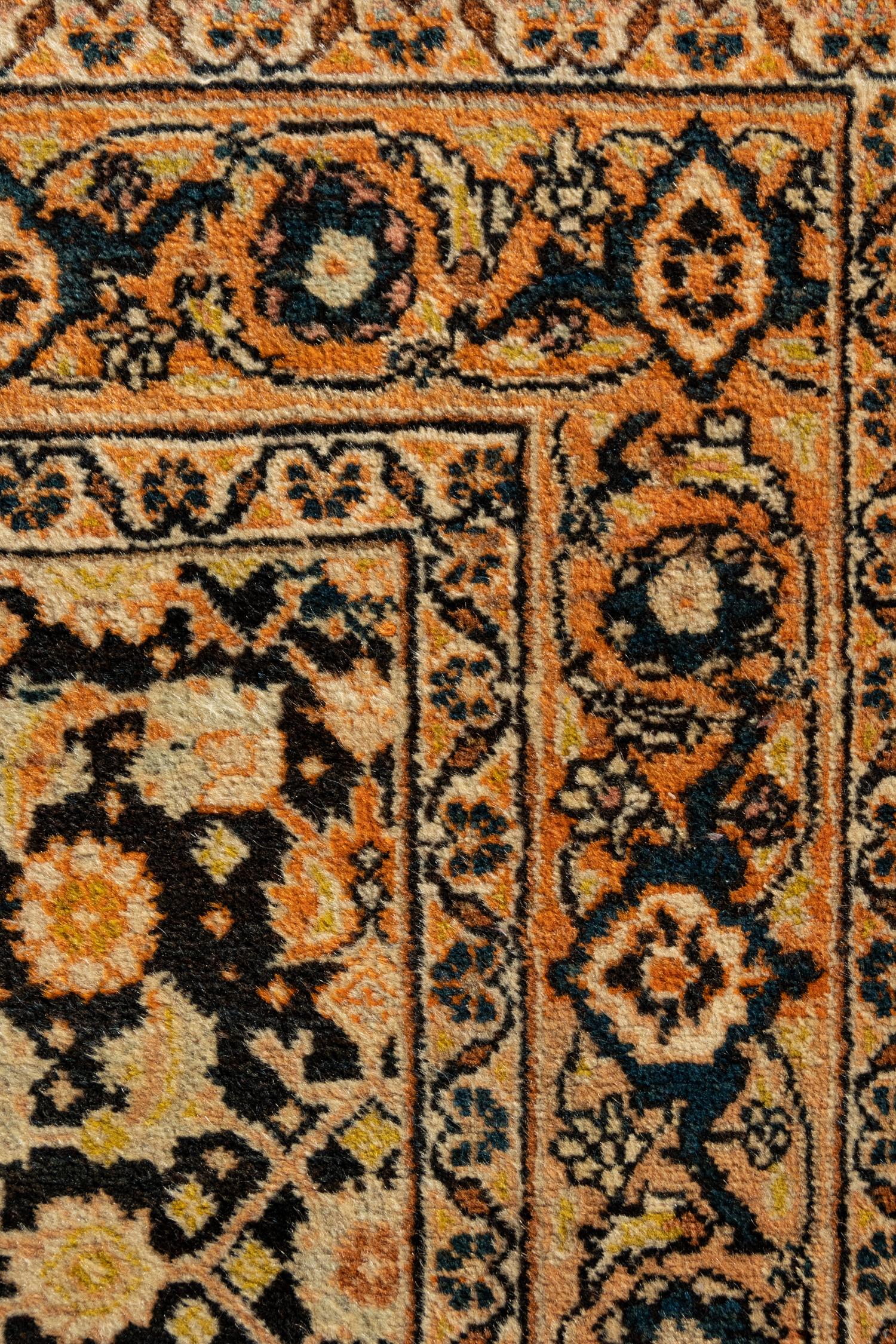 A Tabriz Wool Rug