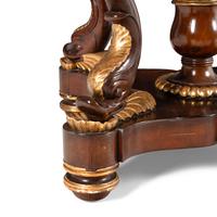 A Late Regency Parcel-Gilt Mahogany and Satinwood Marble-Inset Center Table