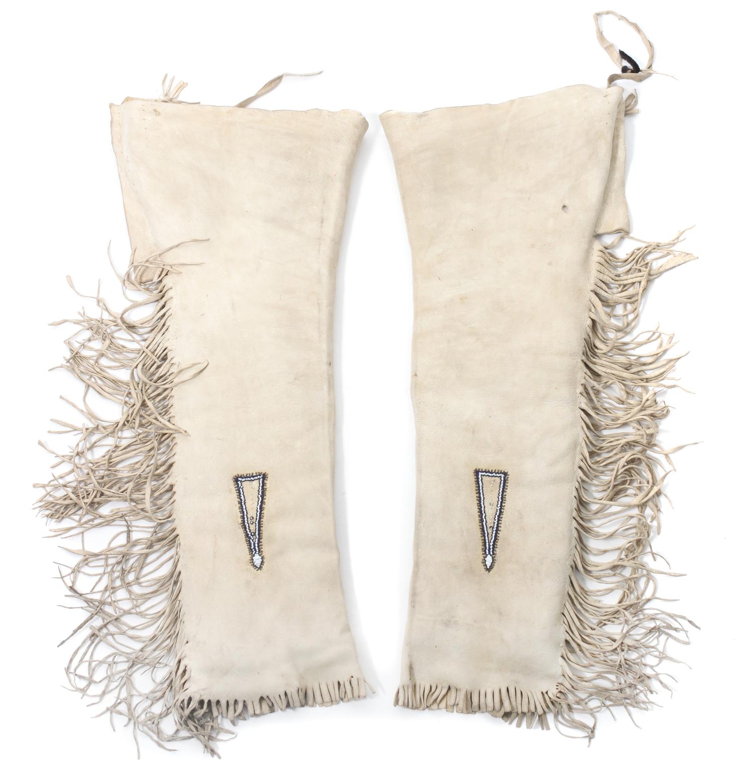 Two Pairs of Blackfeet Quilled Leggings Length of first 33 1/2 inches.