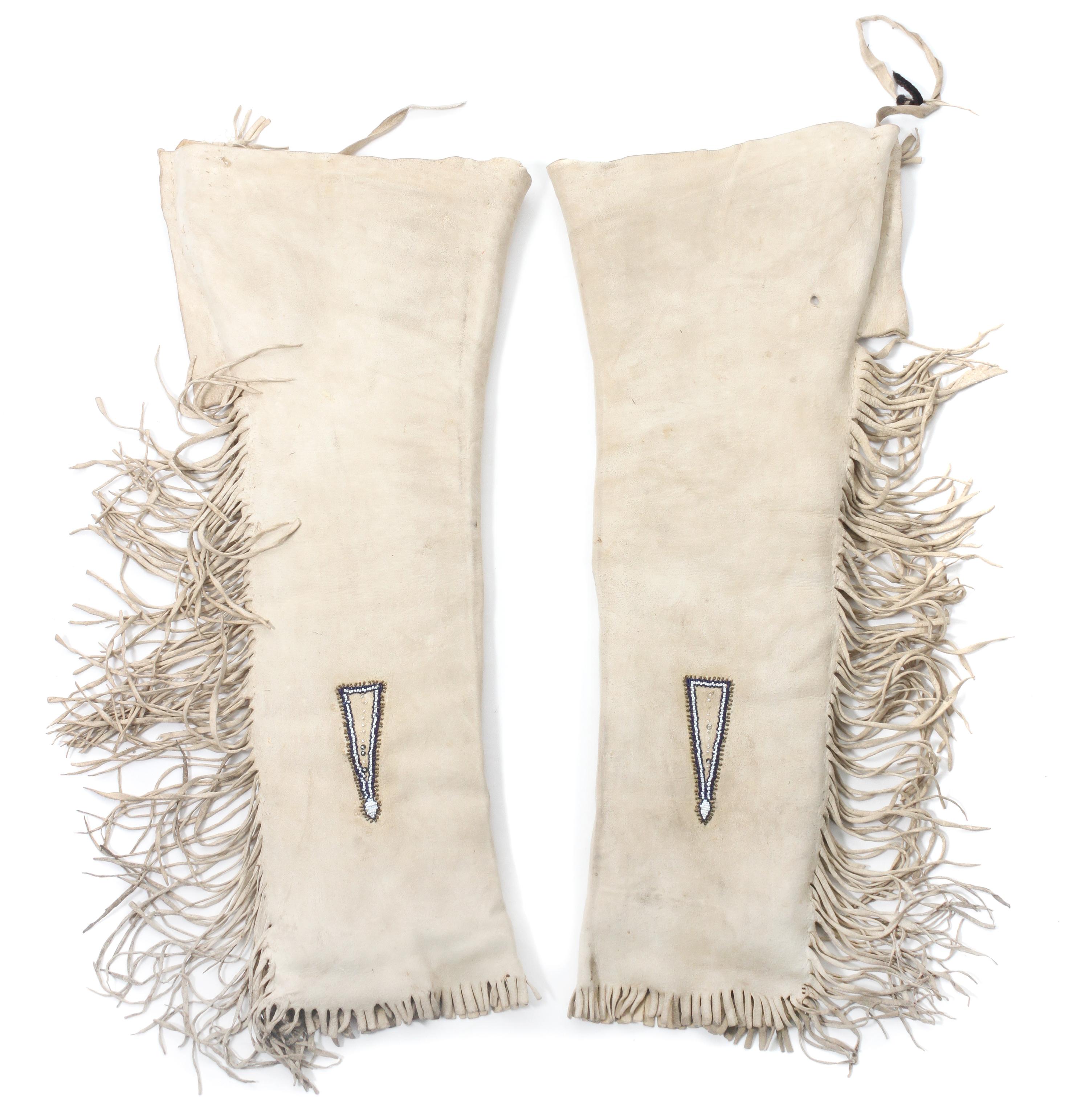 Two Pairs of Blackfeet Quilled Leggings Length of first 33 1/2 inches.