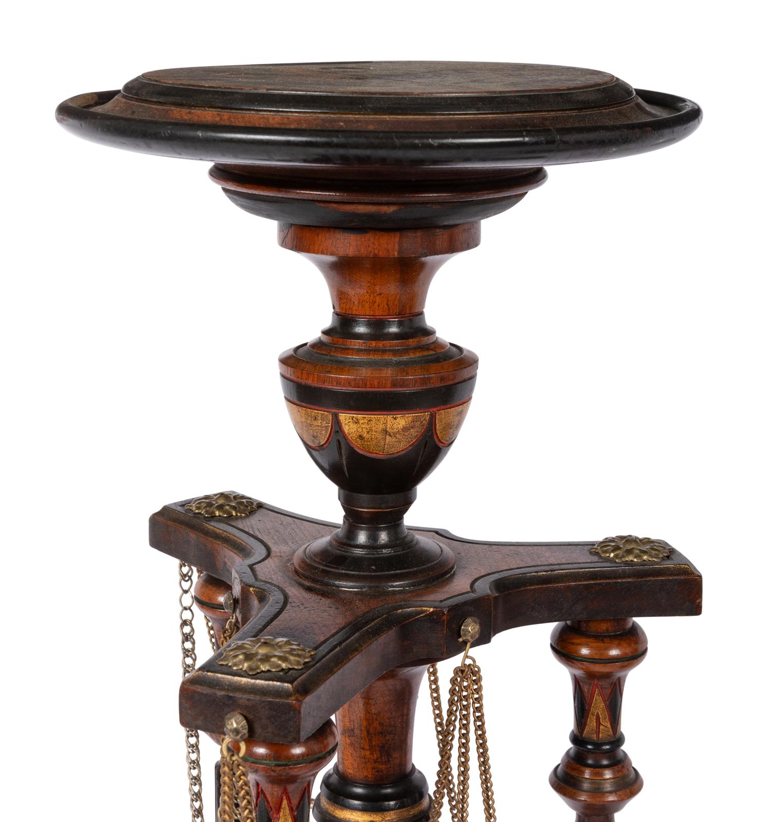 A Pair of Victorian Part-Ebonized and Gilt Walnut Plant Stands