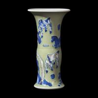 A Chinese Celadon Ground Copper Red, Blue and White 'Horses' Gu Vase, Kangxi Period 清康熙 豆青地青花釉裏紅八駿圖觚
