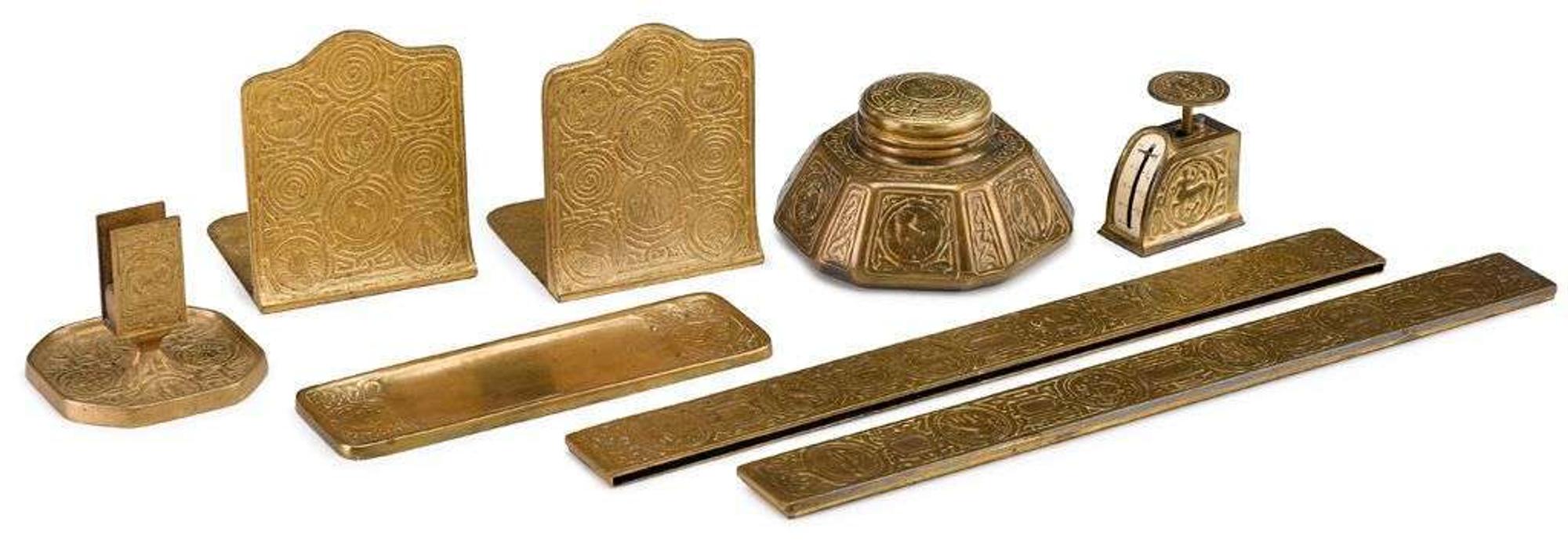 Eight piece gilt bronze "Zodiac" desk set tiffany studios, new york, ny, early 20th century