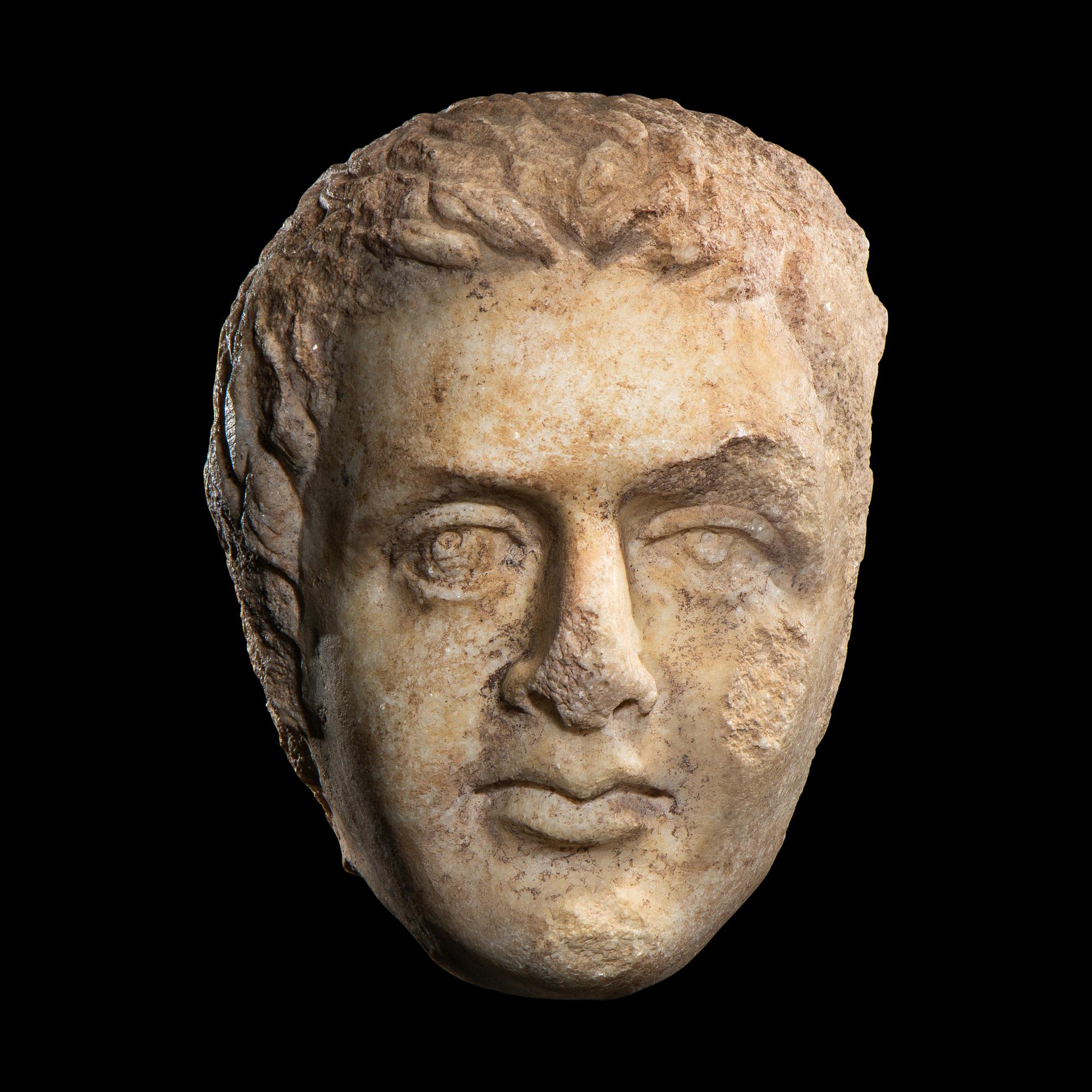 A Roman Marble Portrait Head of a Youth