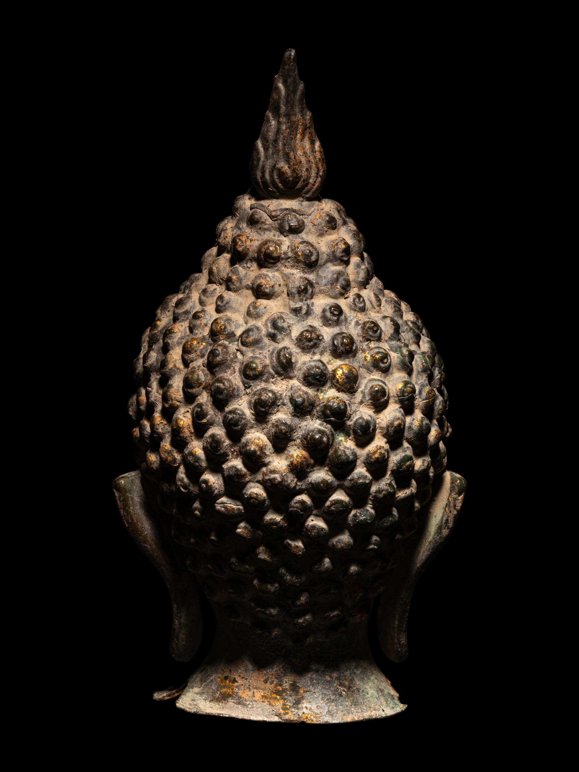 A Bronze Buddha Head
