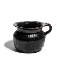 A Greek Black-Glazed Ribbed Mug