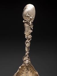 An American Parcel Gilt Silver Serving Spoon
