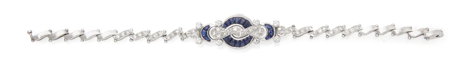 A Platinum, Sapphire and Diamond Surprise Watch, Gubelin, 16.60 dwts.