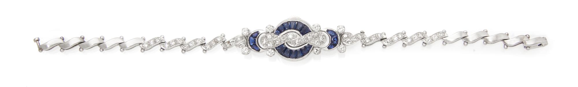 A Platinum, Sapphire and Diamond Surprise Watch, Gubelin, 16.60 dwts.
